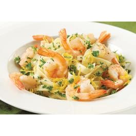 a white plate topped with pasta and shrimp