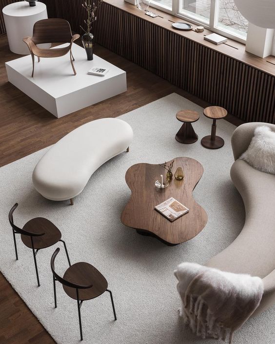 an aerial view of a living room with furniture and accessories on the carpeted floor