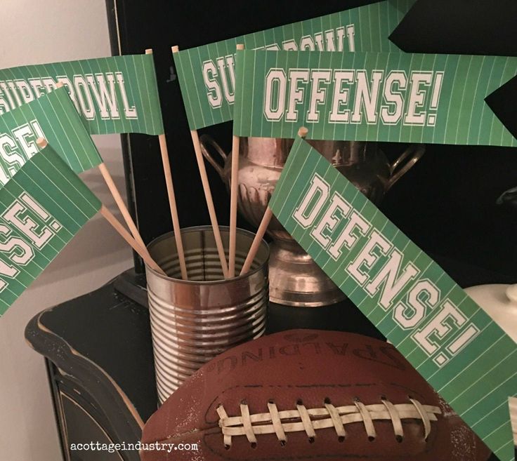 THESE FLAGS ARE THE  PERFECT ADDITION TO YOUR SUPERBOWL PARTY buffet table! (Offense and Defense Flags can be used all throughout football season!) Six paper flags on wooden dowels, 3 facing left, 3 facing right. Two each: Defense, Offense, and Superbowl Perfect for you to use to decorate your buffet table, party room, door wreath and more. Find coordinating printable and hard copy Superbowl items here:    https://www.etsy.com/shop/ACottageIndustry?ref=listing-shop-header-item-count&section_id=7660539 Find the entire set of ready made football paper items here:   https://etsy.me/3QC9WPi Not ready to order just yet? Save this to your Pinterest board! Football Concession Stand, Football Munchies, Buffet Table Party, Football Dinner, Homecoming Poster, Paper Football, Football Fundraiser, Tailgate Party Food, Tailgate Decorations