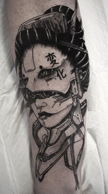 a man's leg with a tattoo on it that has an image of a person wearing