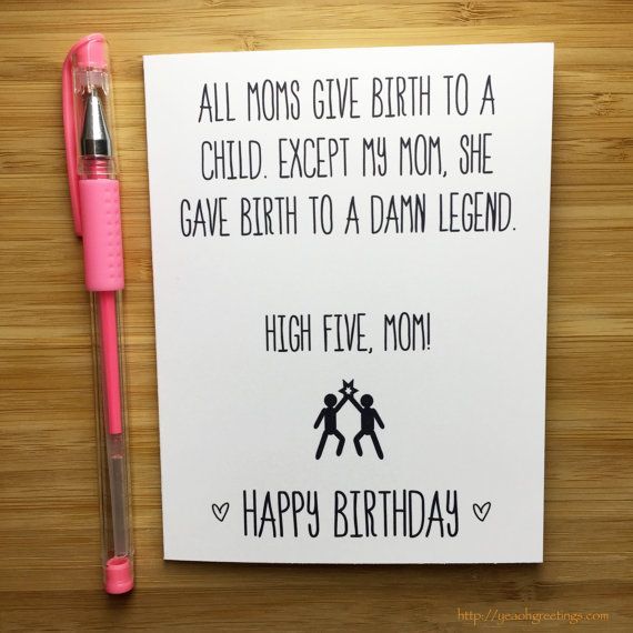 a birthday card with a pink pen next to it on a wooden surface, which says, all moms give birth to a child except my mom she gave birth to a damn legend