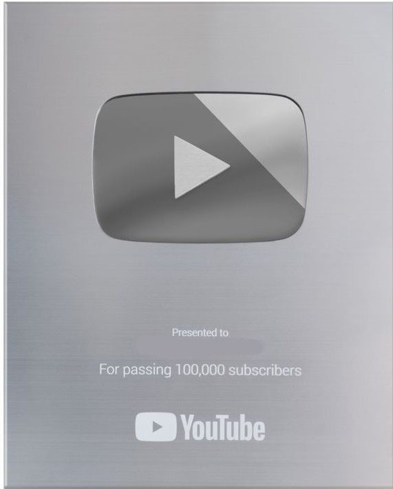 the youtube logo is displayed on a metal plaque that reads, for passing 100 000 subs