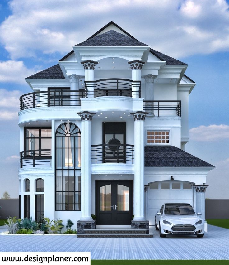 a white car is parked in front of a large, two story house with balconies