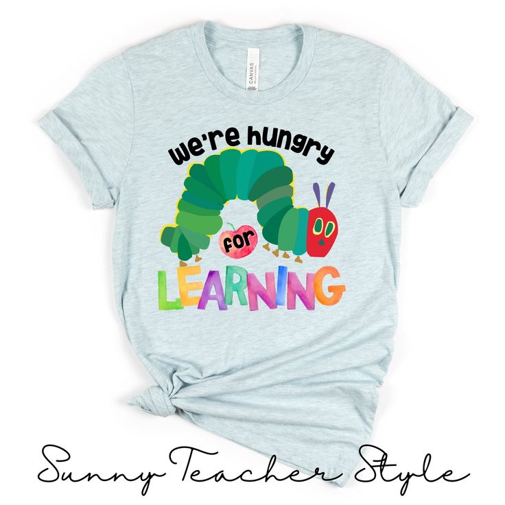 We're Hungry for Learning ~ Teacher Shirt 🔆FEATURES: * 100% Airlume combed and ringspun cotton * Light Weight: 4.2 oz. * Relaxed Fit * Tear Away Label * Dual Side Seams * Taped Shoulders for better fit * Runs true to Size 🔆UNISEX SIZING: Please refer to size chart 🔆CARE INSTRUCTIONS: - Wash colors separately - Tumble dry on slow setting - Iron on low heat on reverse side to print - Do NOT iron print - Do not dry clean - Do not bleach 🔆This shirt is MADE TO ORDER.  🔆PRODUCTION: 1 - 4 days We Early Childhood Teacher Shirts, Kindergarten Teacher Tshirt Ideas, Cute Preschool Teacher Shirts, Hungry Caterpillar Teacher Shirts, Preschool T Shirts, Preschool Teacher Shirts Designs, Infant Teacher Shirts, Teacher Graphic Tees, Elementary School Outfits