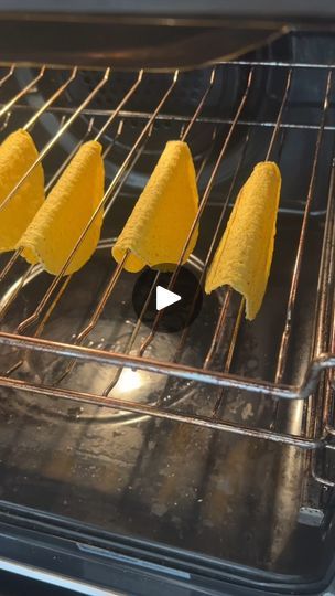 some food is cooking in an oven and it looks like they are going to be cooked