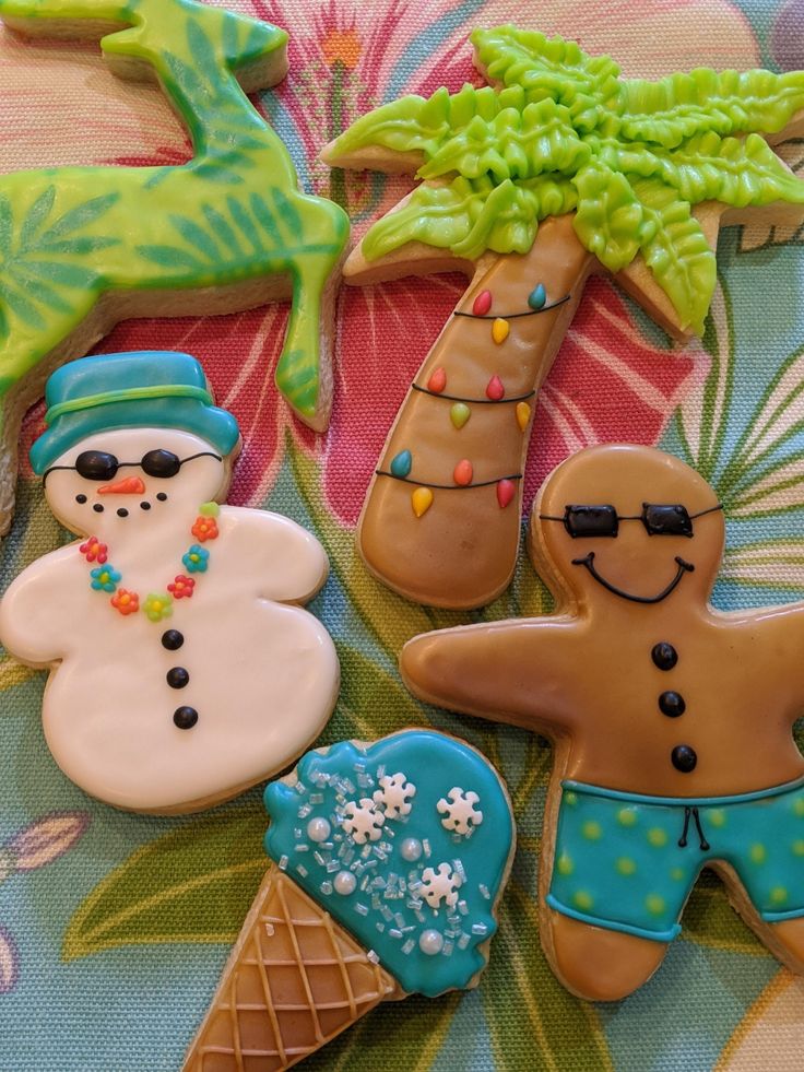 some decorated cookies are sitting on a table