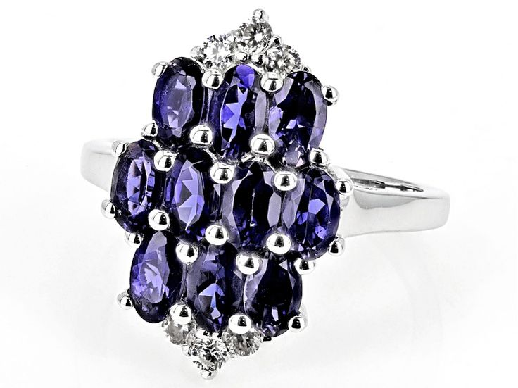 1.80ctw Oval Iolite With 0.28ctw Round White Zircon Rhodium Over Sterling Silver Ring. Measures Approximately 0.81"L x 0.52"W. Not sizeable.  Accent stones primarily zircon. Sterling Silver Ring, Silver Ring, Sterling Silver Rings, Silver Rings, Sterling Silver, Ring, Purple, Silver, White