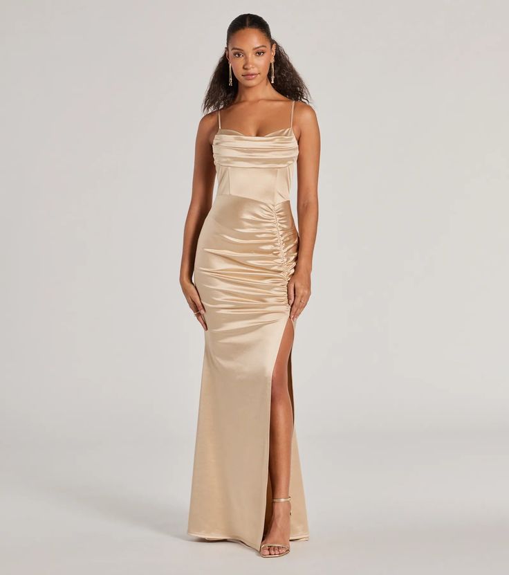 Simply stunning and beautiful is how you'll feel in the Jazmine satin formal dress perfect for weddings, bridesmaids, or fancy soirees! Made from a silky satin fabric, this gown offers a luxurious shine and sultriness to your evening look. She boasts delicate spaghetti straps and a cowl neckline, a flattering A-line silhouette designed with a front ruched seam atop a sexy high slit, and is finished with a floor-length hem. Complete the look with heels and sparkly earrings.Fit & FeaturesSatin Gold Long Dress, Homecoming Inspo, Orange Homecoming Dresses, Purple Homecoming Dress, Backless Dress Short, Satin Formal Dress, Spring Formal, Green Homecoming Dresses, White Homecoming Dresses