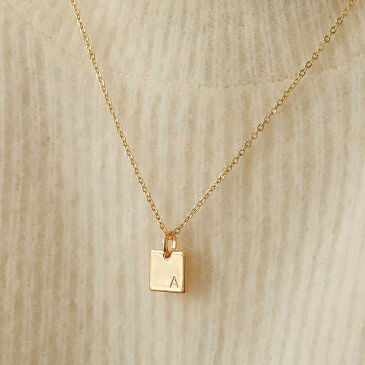 "This dainty gold necklace will be your new go-to minimalist pendant necklace! Personalize it with your or your loved one's initial - we stamp it for you. Made out of high quality gold plated & gold filled materials and perfect for everyday wear. It is an excellent layering necklace and is great as a gift for your friends and yourself! Other Personalized Necklaces: https://www.etsy.com/shop/AyouJewelry?section_id=31672095 D E T A I L S * 16K gold plated pendant * 14K gold filled necklace --- Gold Sentimental Initial Necklace, Cheap Sentimental Initial Pendant Necklace, Affordable Minimalist Initial Necklace As Personalized Gift, Cheap Minimalist Initial Necklace For Personalized Gift, Initial Pendant Necklace Relationship, Gold Necklace For Boyfriend, Minimalist 14k Gold Filled Initial Necklace Gift, Dainty 14k Gold Filled Engraved Charm Necklaces, Minimalist 14k Gold Filled Charm Necklace With Initial Pendant