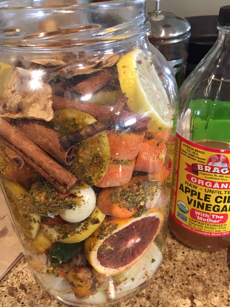 a glass jar filled with food sitting on top of a counter