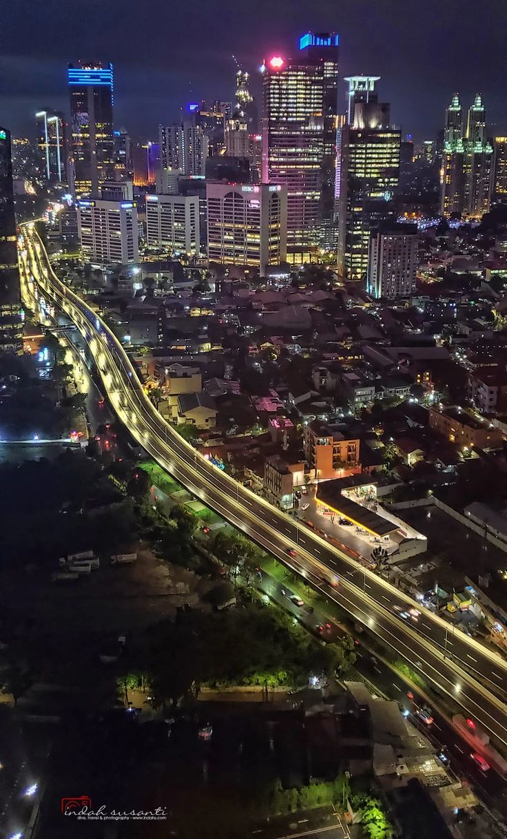 an aerial view of a city at night