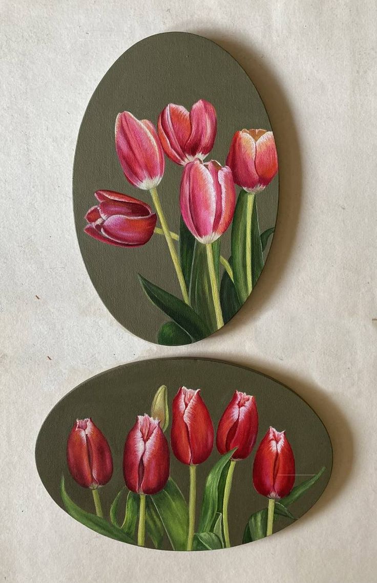 two plates with flowers painted on them