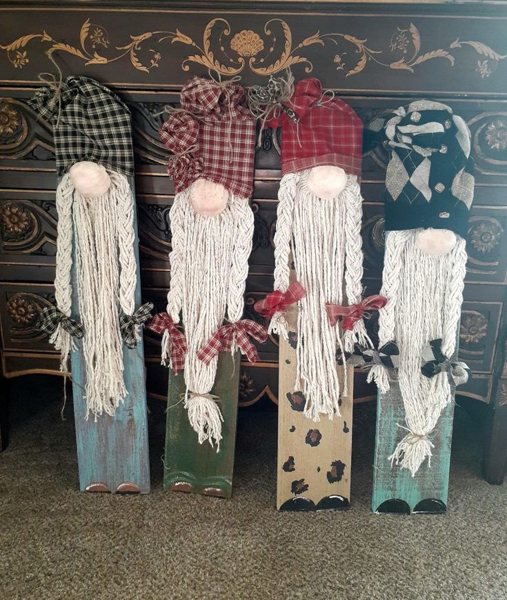 three decorative items are sitting in front of a dresser