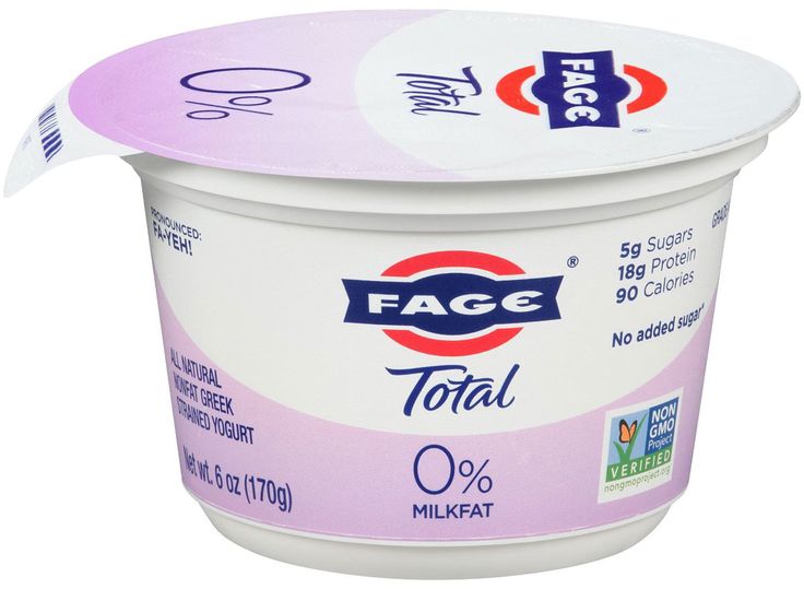 yogurt in a plastic container is shown on a white background with the words face total