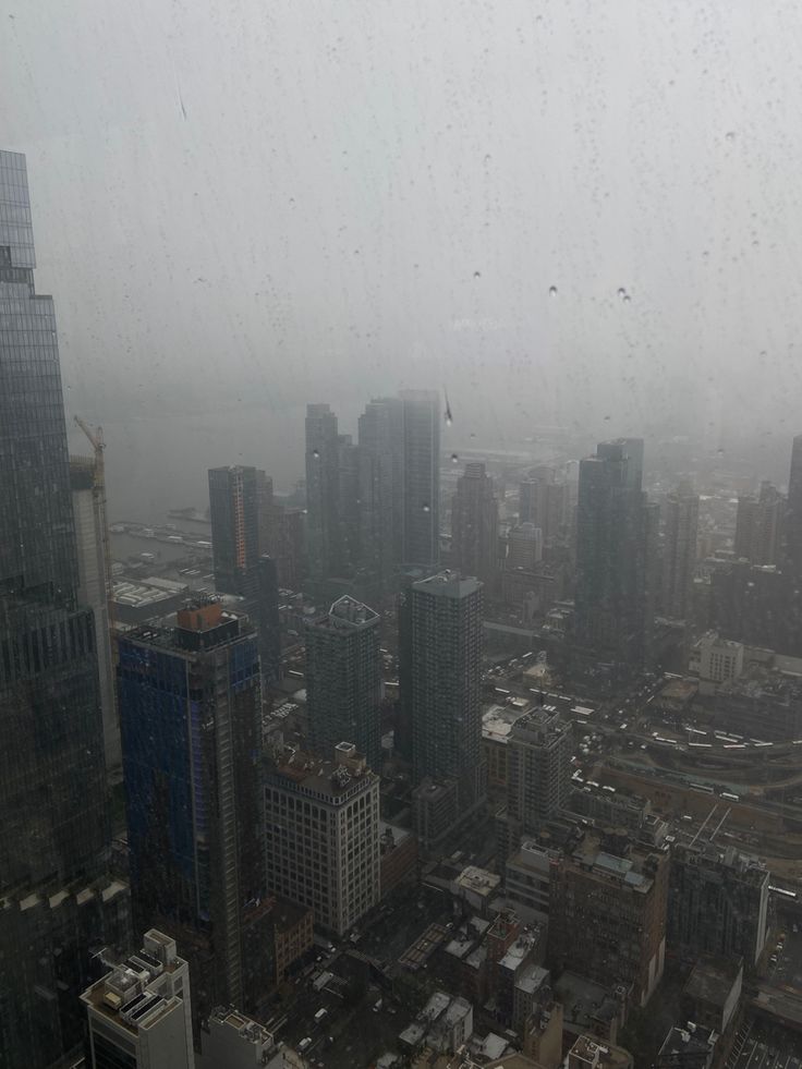 an aerial view of a city in the rain