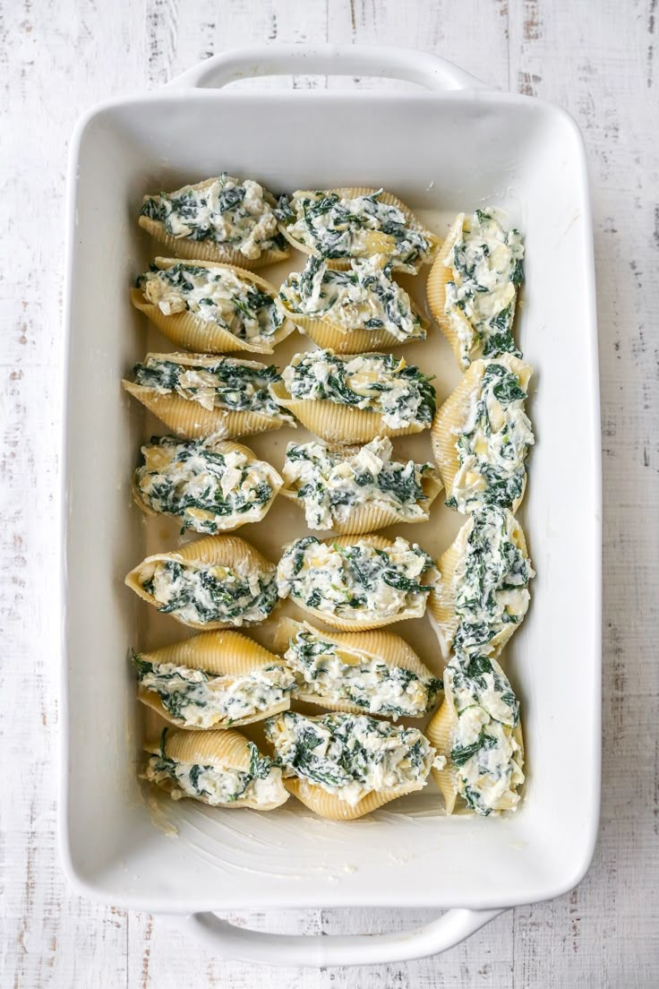 spinach and cheese stuffed shells in a casserole dish