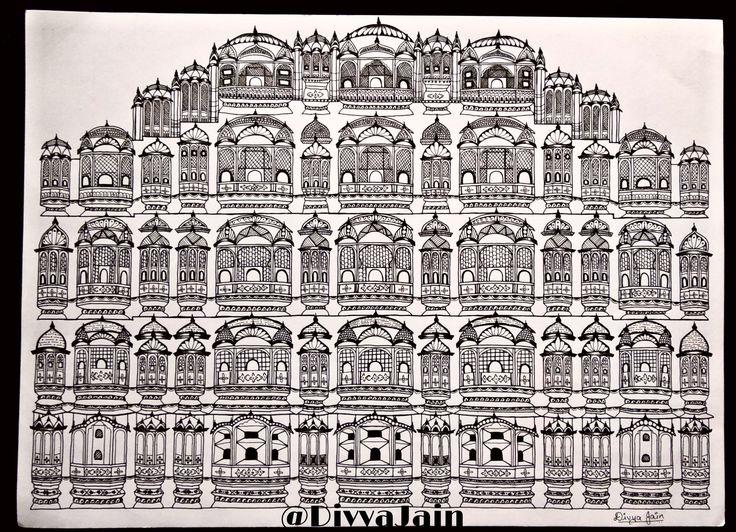 an intricately designed building with many windows and balconies on the front, in black and white