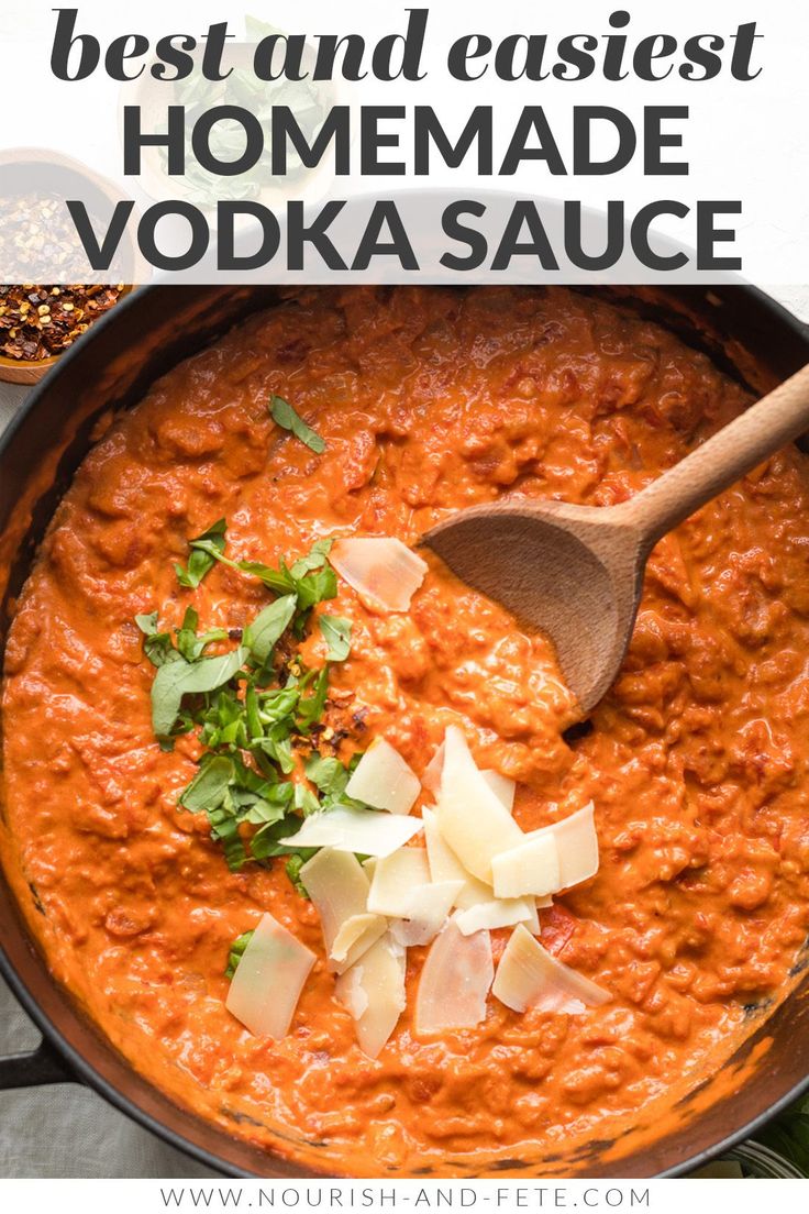 the best and easy homemade vodka sauce in a skillet with a wooden spoon on top