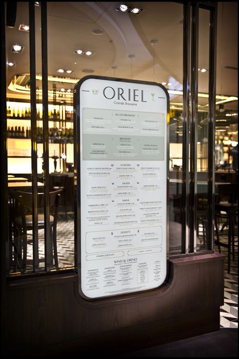 a sign in front of a restaurant window that says, orielt on it