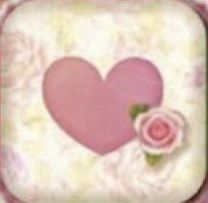 a pink heart with a rose in the center