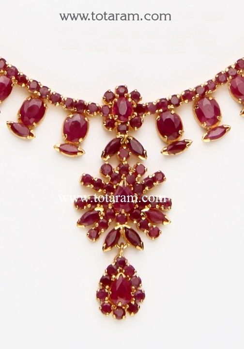 22 Karat Gold Ruby Necklace & Long Earrings Set with intricate workmanship. 
  Gross Gold Weight: 38.500 grams
  Ruby Weight: 30.00 Carats
  Length of Pendant : 1.60 inches 
  Width of Pendant : 0.70 inches 
  Width of the sides of Necklace: 0.40 inches
  Length of Earring : 1.50 inches
  Width of Earring : 0.50 inches
   - 235-GS1515 - in 38.500 Grams for USD $3628.49. 
Made in India by Totaram Jewelers Online this product is in Gold - 22 Karat BIS Hallmark 916 KDM Gold  & is an exce Ruby Light Weight Necklace, Indian Ruby Necklace, Ruby Indian Necklace, Luxury Red Temple Necklace For Gift, Luxury Ruby Chandbalis In Temple Jewelry Style, Ruby Jewelry Necklaces Gold, Kempu Necklace, Ruby Necklace Designs, Gold Ruby Necklace