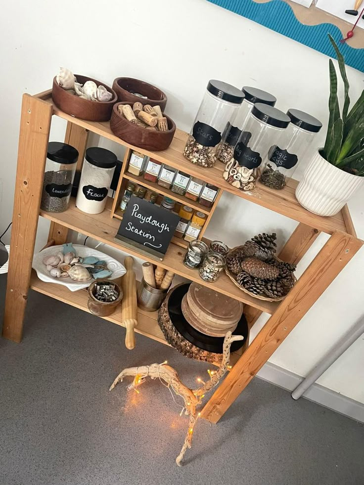 a wooden shelf filled with lots of different items