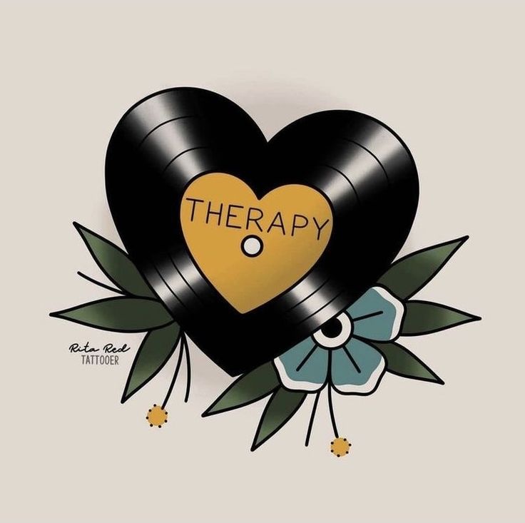 a heart shaped vinyl record with the word therapy written on it and flowers around it