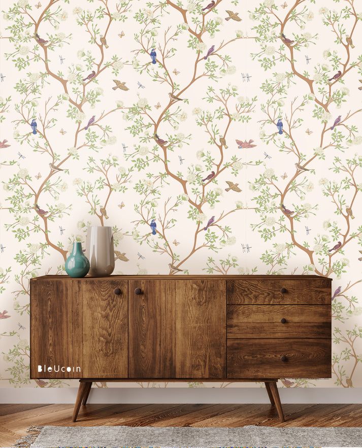 a wooden cabinet with two vases sitting on top of it next to a wallpaper