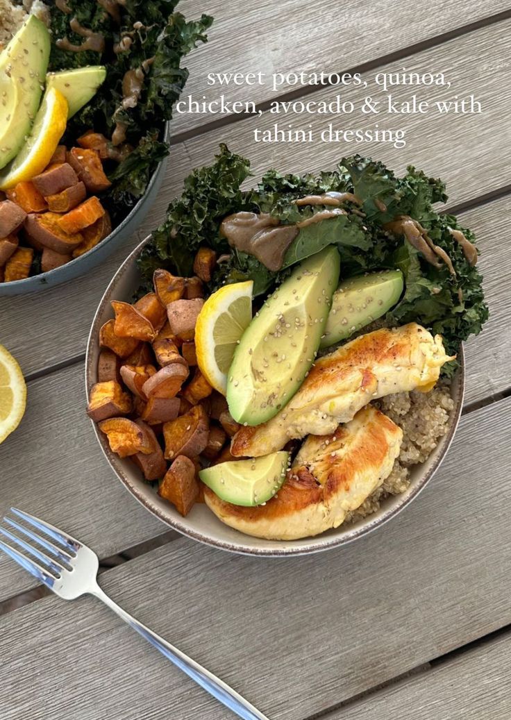 two bowls filled with chicken, avocado and kale on top of rice