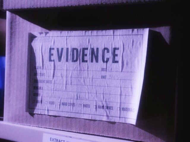 a piece of paper with the words evidence taped to it