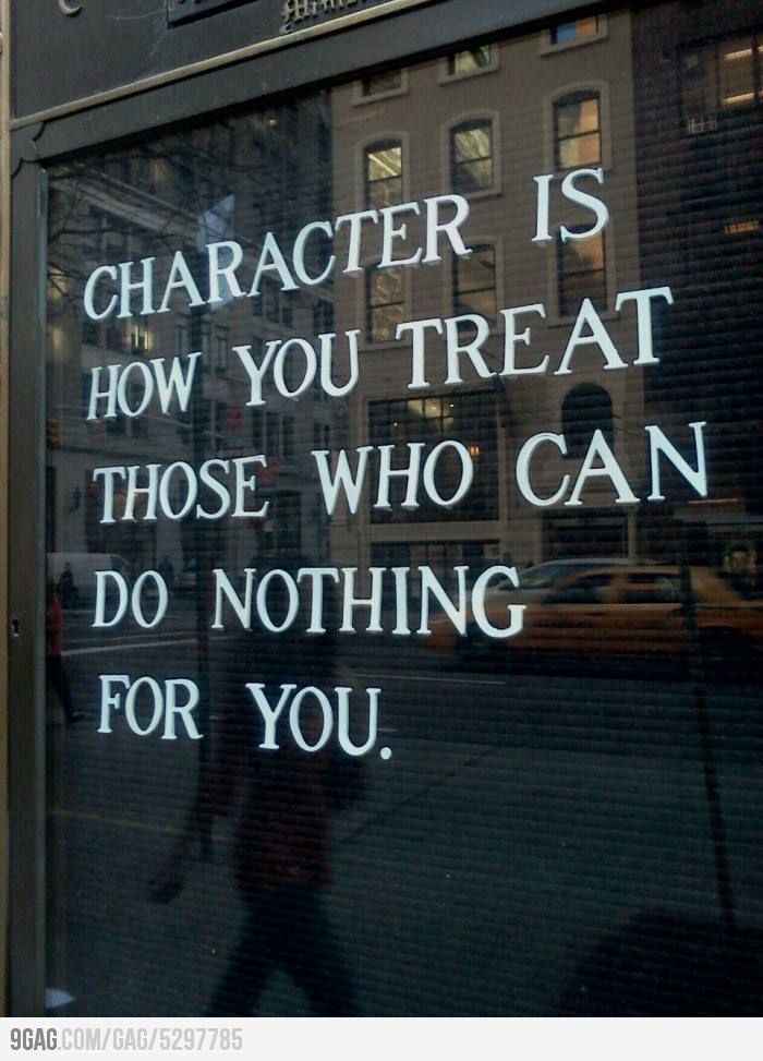 a sign on the side of a building that says character is how you treat those who can do nothing for you