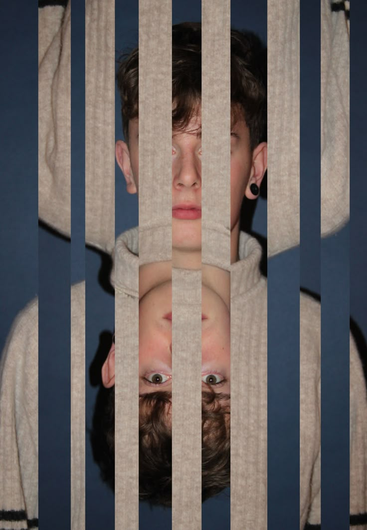 two people behind bars looking at each other through the bars in front of their faces