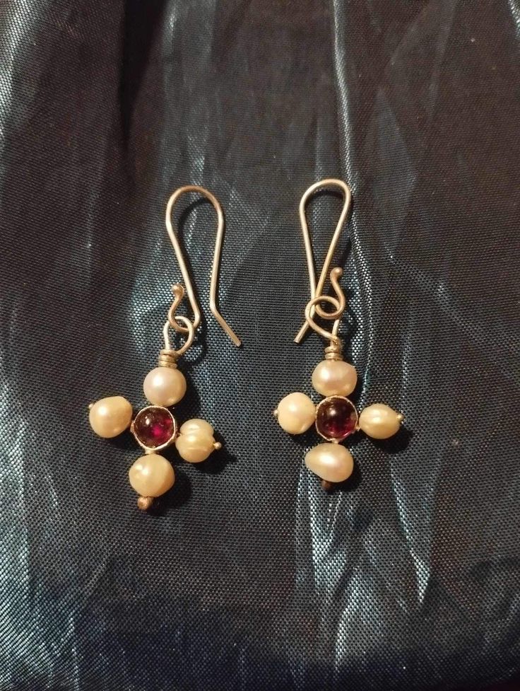 This beautiful earrings made based on pendant of 5-6 centuries AD.  These earrings will be perfect complement for your garb or everyday clothes. Earrings made of Sterling silver with freshwater pearls and garnet cabochons. Medieval Earrings, Byzantine Earrings, Earrings With Pearls, Early Medieval, Everyday Clothes, Cross Earrings, Little Gifts, Beautiful Earrings, Metal Working