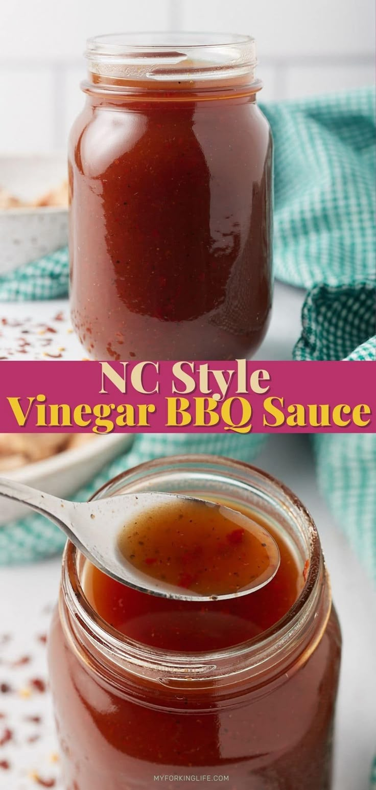 a jar filled with bbq sauce sitting on top of a table next to a spoon