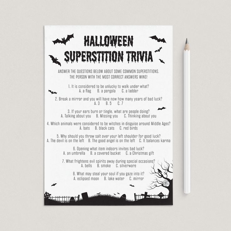 a halloween superstition trivia is shown next to a pencil and eraser