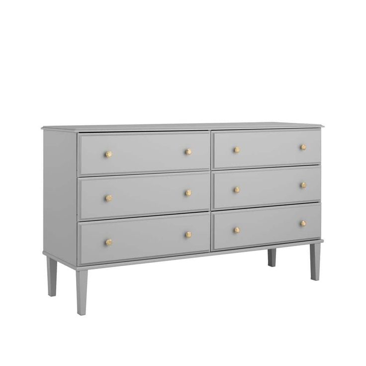 a gray dresser with gold knobs on it's drawers and legs, against a white background