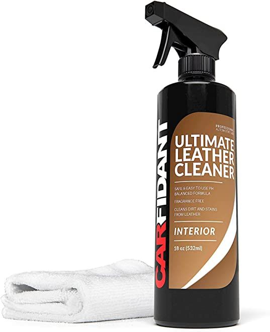 a bottle of leather cleaner next to a white towel on a white background with a black sprayer