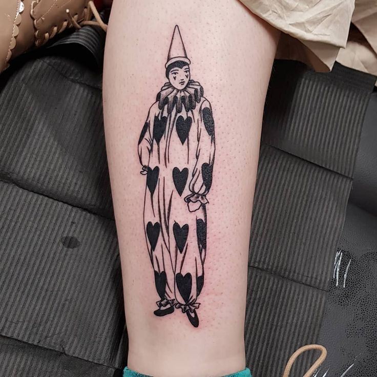 a person with a tattoo on their leg