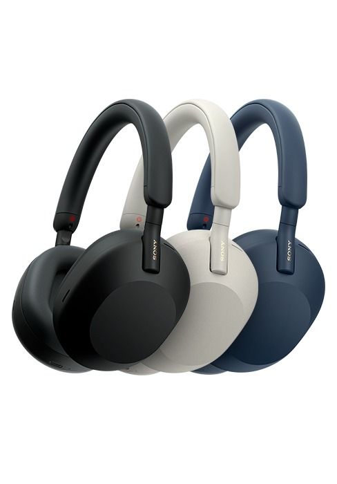 three headphones sitting side by side on top of each other in different colors and shapes