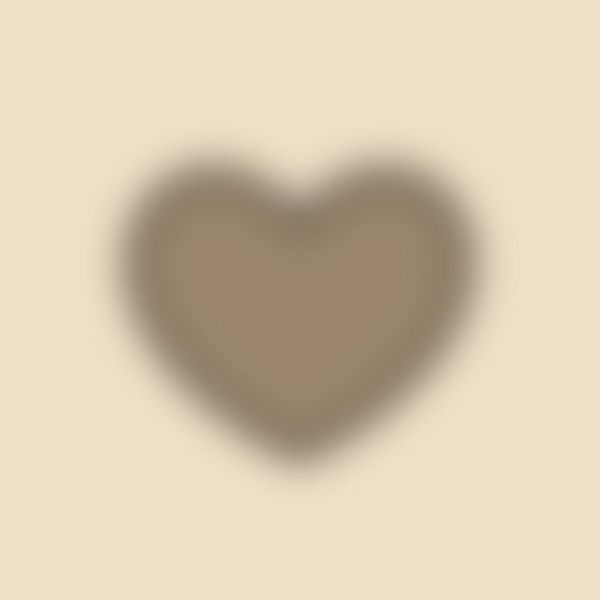 the shadow of a heart on a beige background