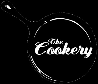 the cookey logo on a black background with white lettering and a frying pan