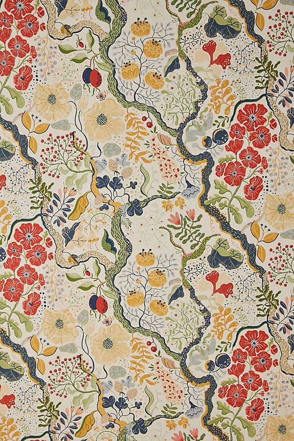 an old wallpaper with colorful flowers and vines on white background, close up view