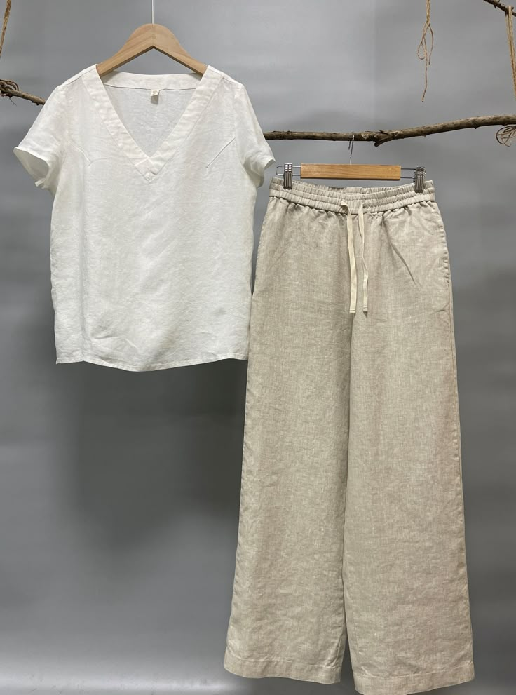 "Classic yet chic relaxed fit linen pants is your wardrobe smart staple. Our Ocean pants are made from 100% linen fabric in earth tone colors, enriching season-spinning versatility from home to office, work to leisure. -100% linen -Straight silhouette -Easy, comfortable, and just right voluminous. -Flat front -Pull-on style -Elastic waistband with pull ribbon (Optional) -2 side welt pockets -Color in listing: Chocolate, Black, Burnt Orange, White, Teal Please provide your natural waist, lower hi Classic Cotton Work Pants, Luxury Flax Pants For Summer, Affordable Light Wash Cotton Pants, Cheap Flat Front Cotton Pants, Luxury Linen Straight Kurta Set, Casual Pants For Daywear, Affordable Summer Pants With Button Closure, Affordable Wide-leg Cotton Pants, Luxury Casual Wide Leg Linen Pants