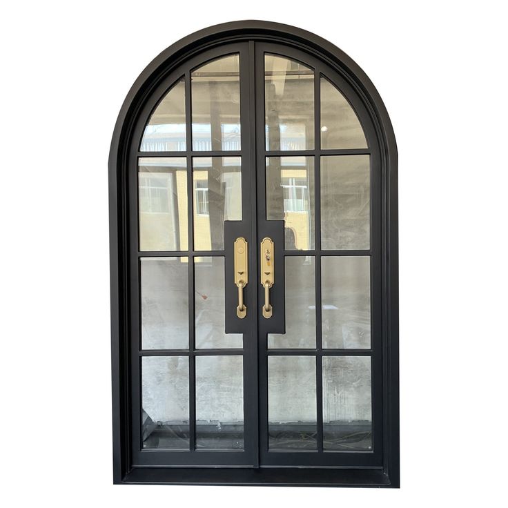 an arched glass door with two handles on each side and one handle on the other