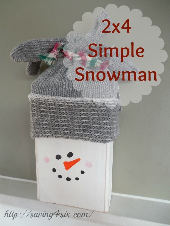 a snowman made out of a box with the words, 2x4 simple snowman on it