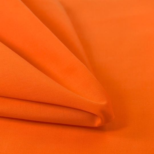 an orange sheet that has been folded up