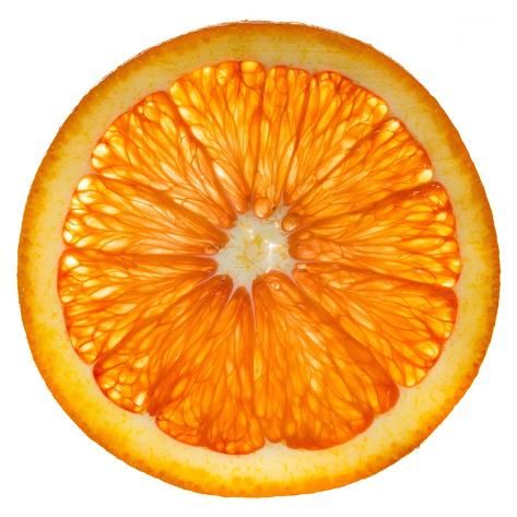 an orange is cut in half on a white background with the center section showing it's core