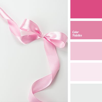 the color scheme is pink and white with a light pink ribbon tied to it's side