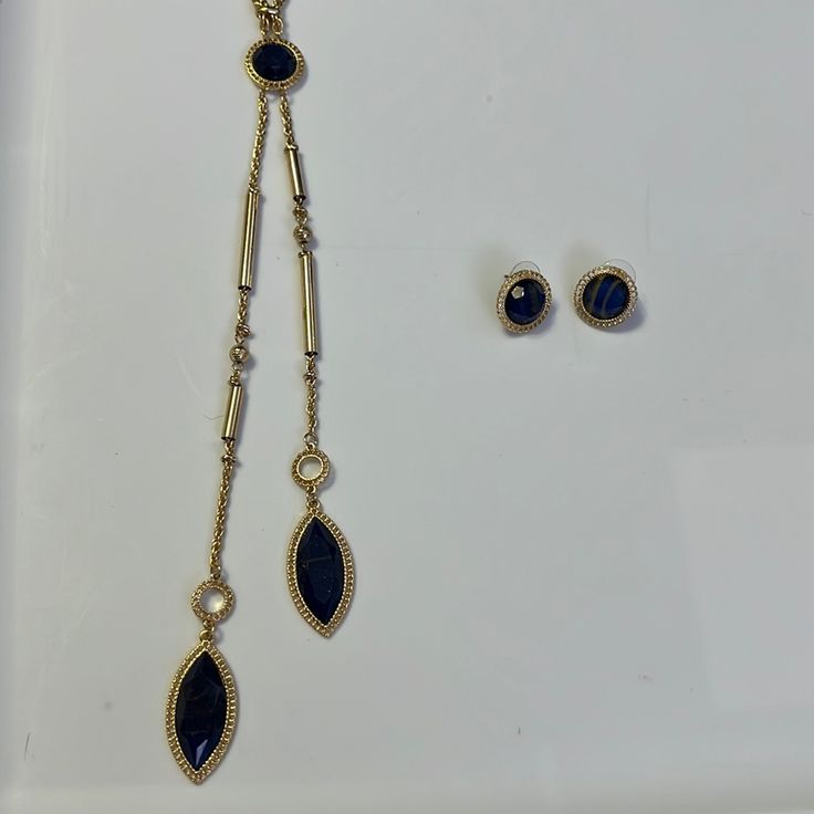 Draper’s & Damon’s Unstamped And Unsigned Gold Tone Vintage Dark Blue (Almost Black - But They Are Blue) Gemstone With Brown Veining Long Necklace And Earrings -Necklace- Lobster Clasp Decoration (Pipes/Cylinders, Disco Balls, Filigree Disc) Still On Original Packaging Approx. 23 Inches In Length (No Extender) -Earrings- Pierced Ear Round Disk Back Closures 3/4 Inch Diameter Comes From Smoke Free, Pet Friendly House. Photos Are Part Of The Description. Hermes Bangle, Pet Friendly House, Pierced Ear, Lapis Necklace, House Photos, Cubic Zirconia Bracelet, Crystal Choker Necklace, Hematite Bracelet, Disco Balls