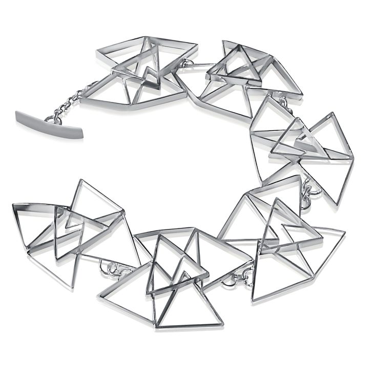 Silver Bracelet - Each link in this fabulous, geometric bracelet consists of five triangles formed from 3mm rectangular sterling silver wire. It closes with a toggle clasp closure. Geometric Bracelet, Toggle Clasp, Silver Wire, Triangles, Precious Metals, Silver Bracelet, Jewelry Bracelets, Bracelet, Sterling Silver